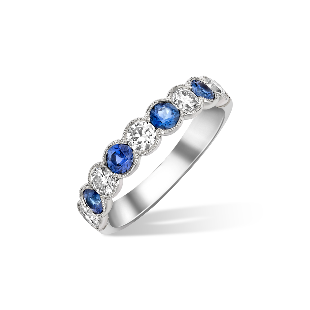 Large Aiyanna sapphire and diamond half eternity ring