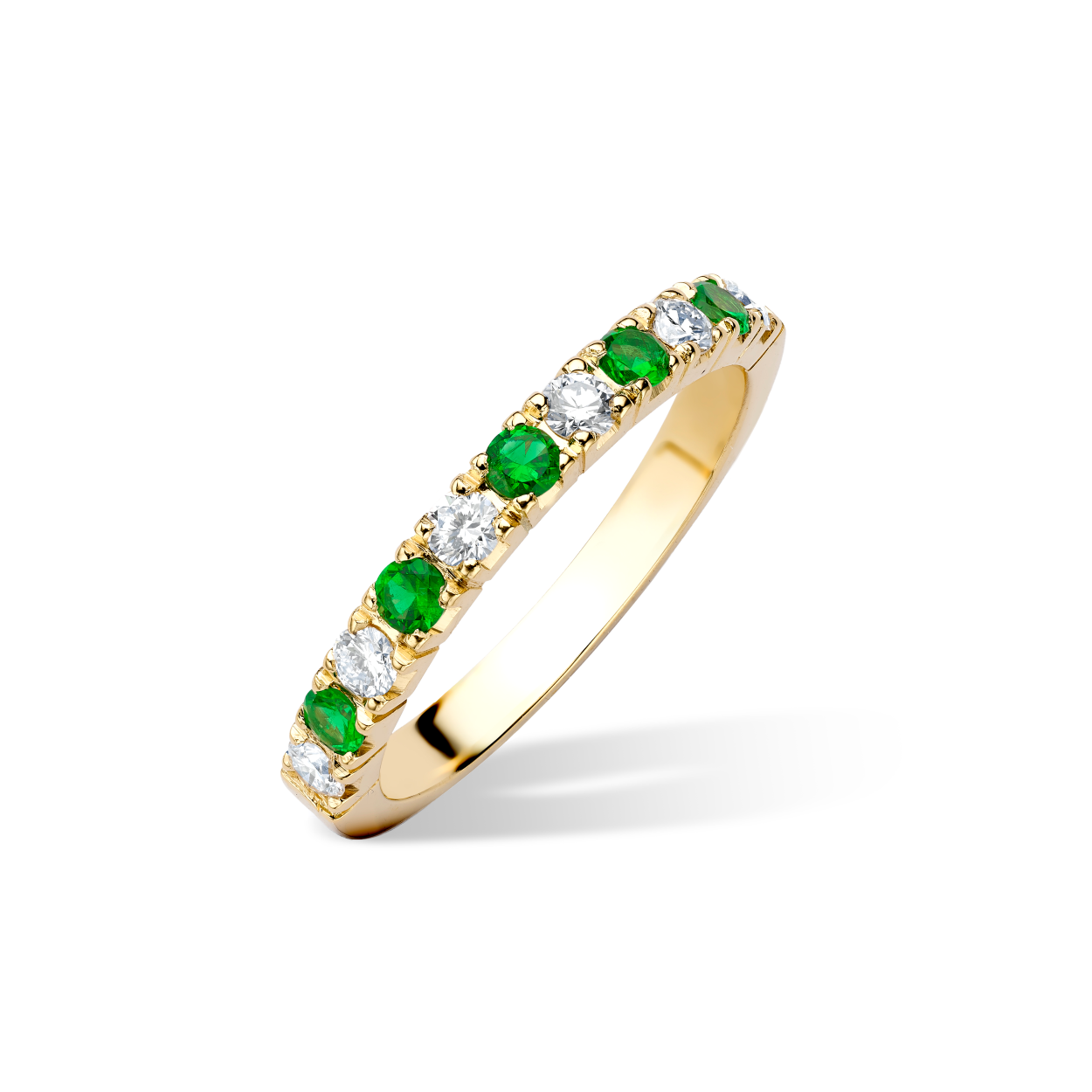 Small emerald and diamond castle half eternity ring