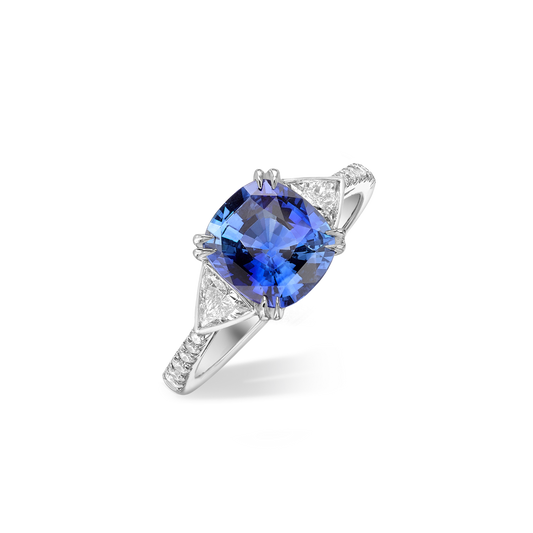 Cushion cut sapphire and trillion diamond ring