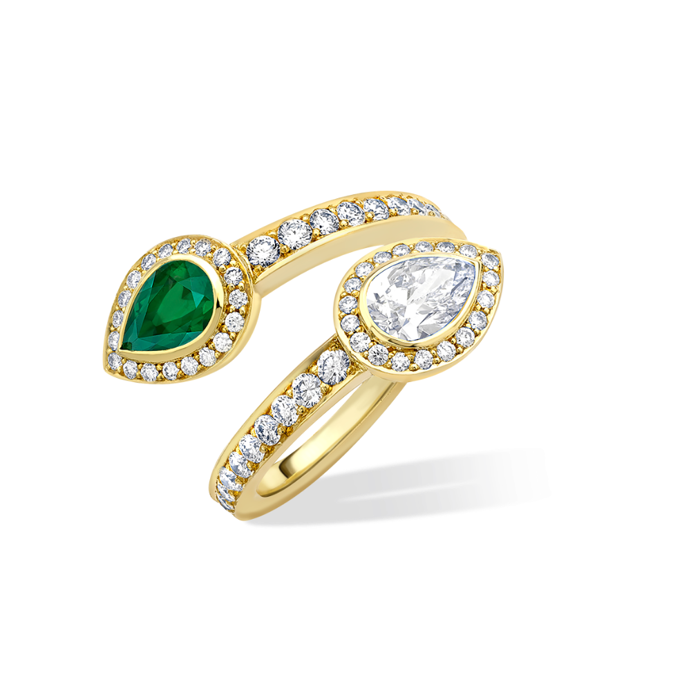 Emerald and diamond crossover ring