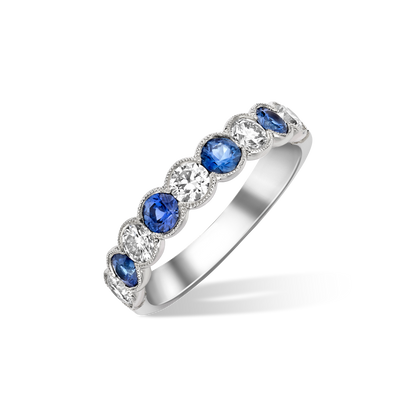 Large Aiyanna sapphire and diamond half eternity ring