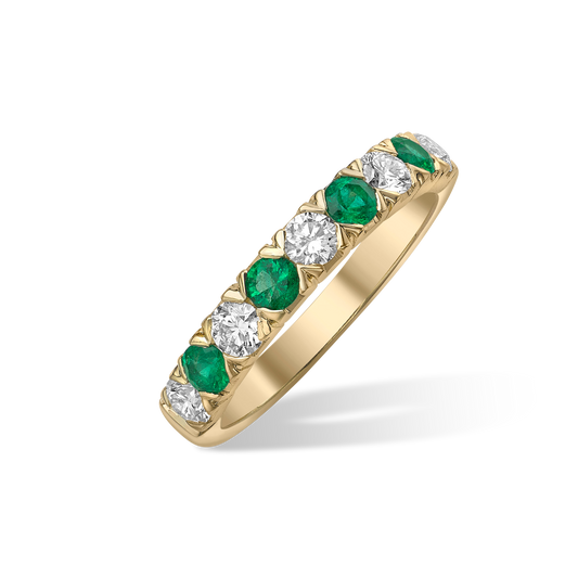 Emerald and diamond V claw half eternity ring