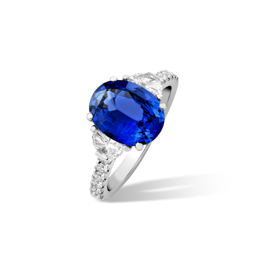 Oval sapphire and half moon diamond ring