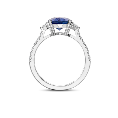 Oval sapphire and half moon diamond ring