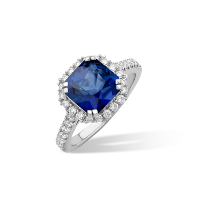 Radiant cut sapphire and diamond cluster ring