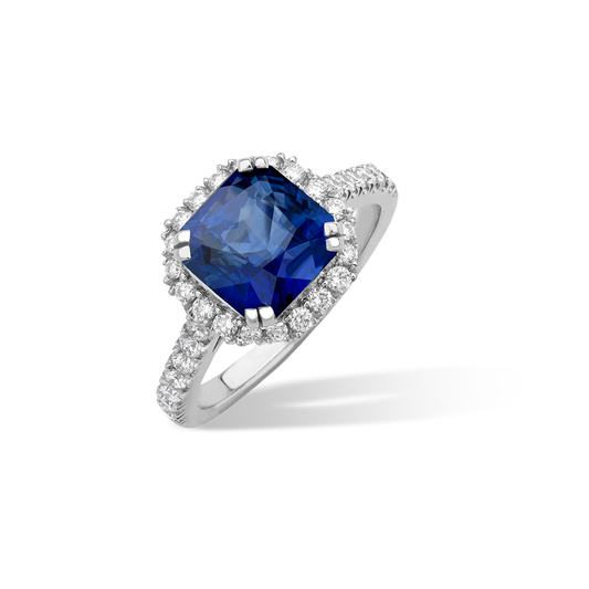 Radiant cut sapphire and diamond cluster ring