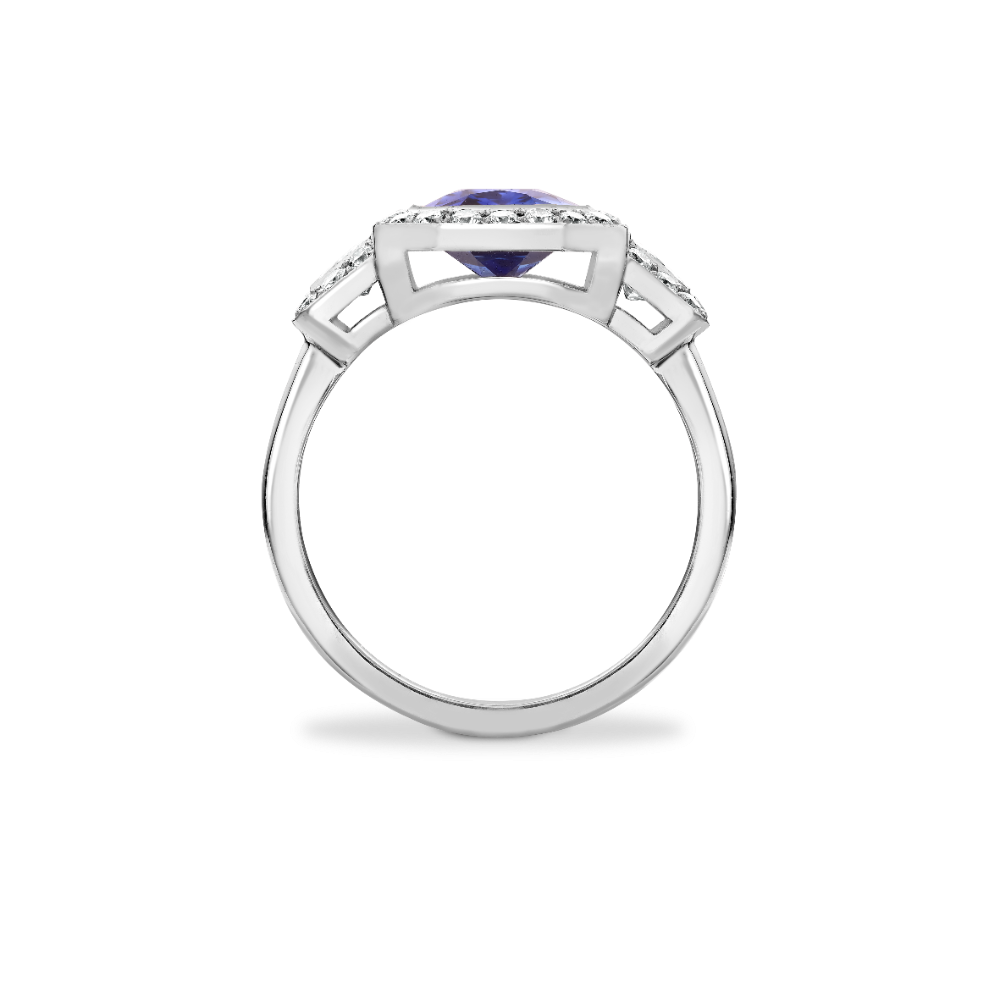 Radiant cut sapphire and trapeze diamond cluster ring