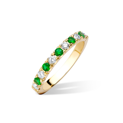 Small emerald and diamond castle half eternity ring