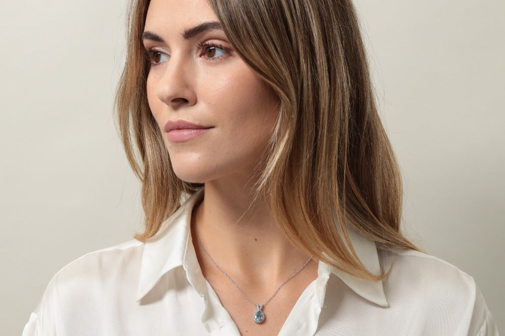 Drop shape aquamarine and diamond pendant
